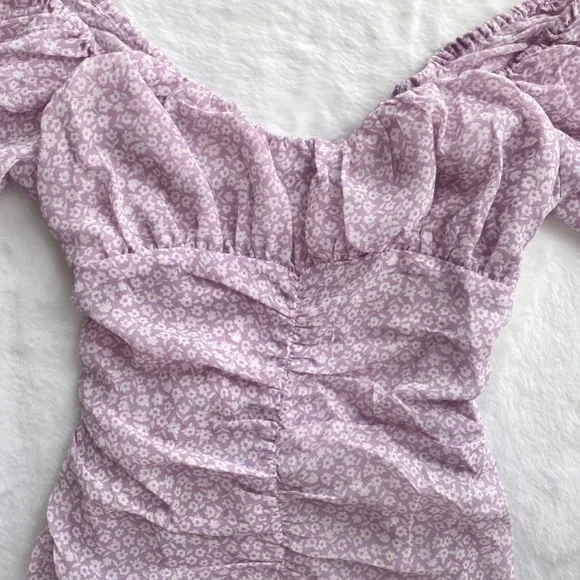 NWT Red Dress Boutique Purple Puff Sleeve Dress w/ Lace Up Open Back - Picture 9 of 16